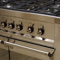 a stainless steel gas range and oven