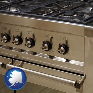a stainless steel gas range and oven - with Alaska icon