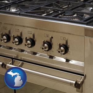 a stainless steel gas range and oven - with Michigan icon