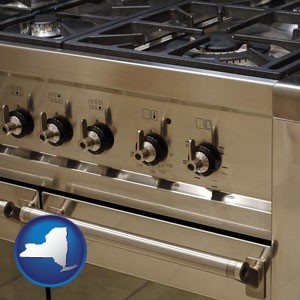 a stainless steel gas range and oven - with New York icon