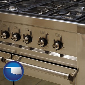 a stainless steel gas range and oven - with Oklahoma icon