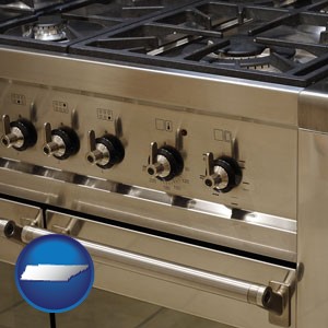 a stainless steel gas range and oven - with Tennessee icon